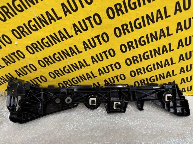 Кронштейн бампера заднього, зовнішній правий BHN1502H1A MAZDA