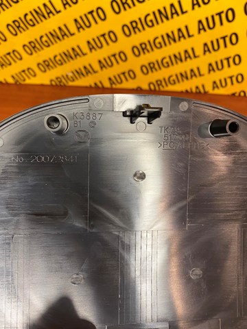 Емблема капота TK7951730 MAZDA