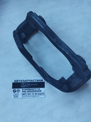 Кронштейн гальмівного супорта A0004207515 MERCEDES