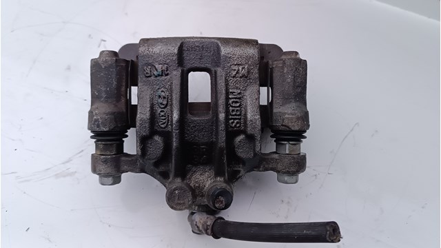 Задній гальмівний супорт лівий 58210C1150 HYUNDAI