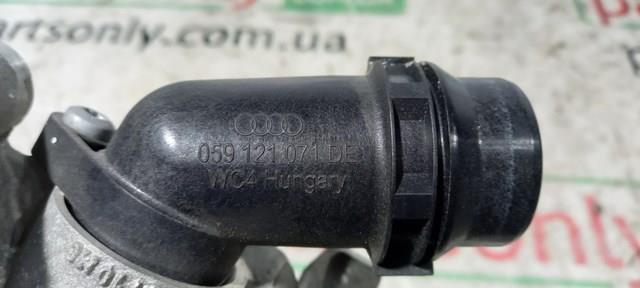 Водяний патрубок 059121071DE VAG