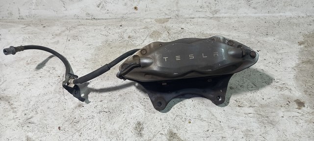 Супорт гальмівний, передній, правий 104264000F TESLA