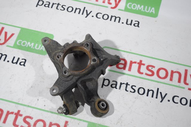 Кулак поворотний правий 28411AL02A SUBARU