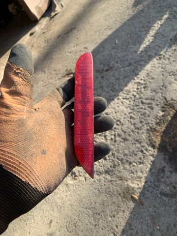 Лівий відбивач бампера 26565JJ90A NISSAN