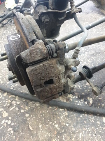 Задній гальмівний супорт лівий 26692FE031 SUBARU