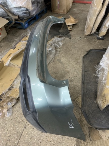 Буфер (бампер) задній 57704SG010 SUBARU