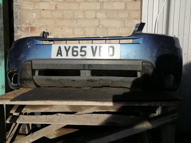 Бампер передній 57709SG001 SUBARU