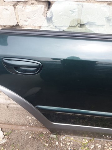 Двері пасажирські задні праві 60409AG0619P SUBARU