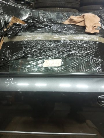 Скло задньої двері лівої 62011AG110 SUBARU