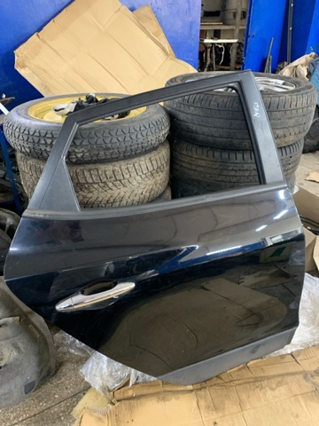 Двері пасажирські задні праві 770042Y011 HYUNDAI