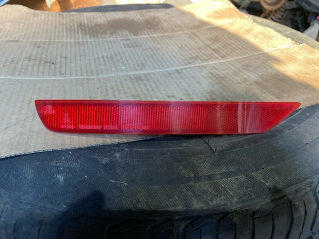 Катафот (відбивач) заднього бампера, лівий 84281SC010 SUBARU