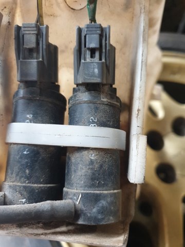 Насос електроомивача заднього 86611AG000 SUBARU
