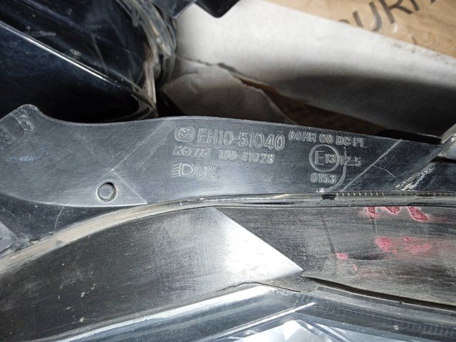Блок фара ліва EH1051040 MAZDA