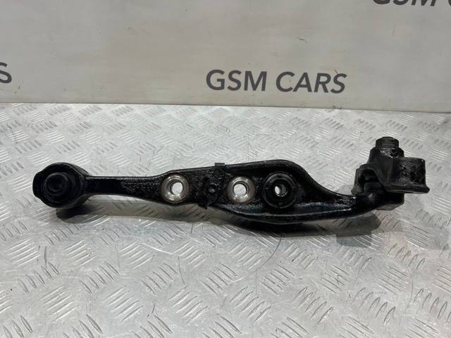 Правий важіль передній нижній підвіски GS1D34300L MAZDA