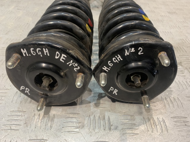 Подушка амортизатора переднього GS1D34380B MAZDA