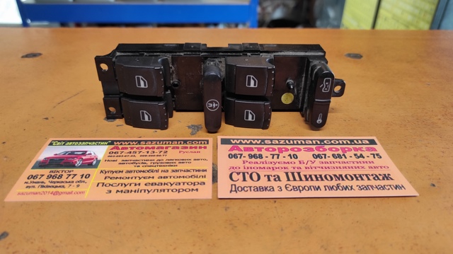 Кнопки переднього лівого склопід'ємника 1J4959857B VAG