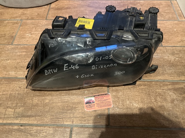Фара ліва 6910967 BMW