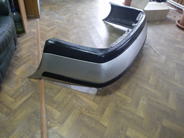 Кожух бампера заднього 1U6807421A VAG