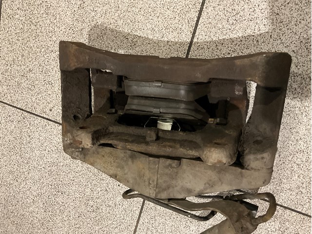 Супорт гальмівний, передній, правий 4F0615124 VAG
