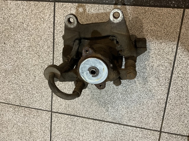 Супорт гальмівний задній правий 4F0615404A VAG