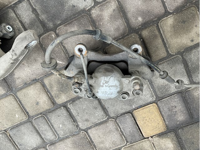 Супорт гальмівний, передній, лівий 4G0615123K VAG