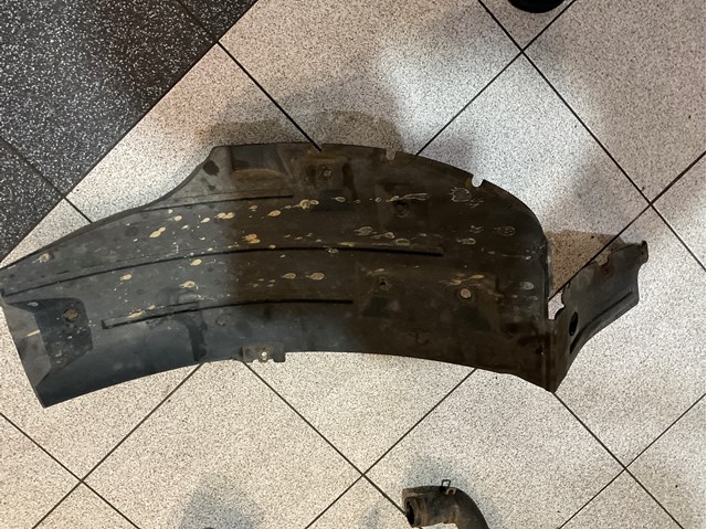 Підкрилок задній лівий 76766EB300 NISSAN