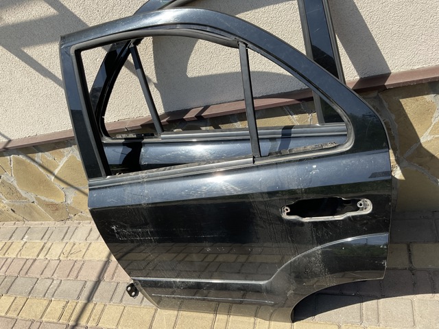 Двері задні 770033E111 HYUNDAI
