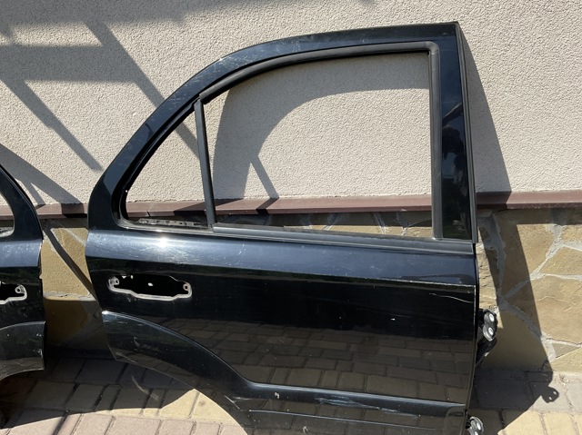 Двері задні в зборі 770043E111 HYUNDAI