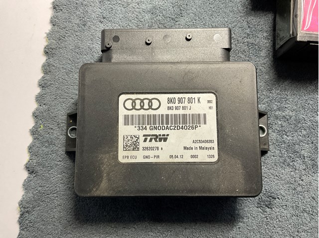 Блок керування (модуль) електромеханічного стояночного гальма 8K0907801K VAG