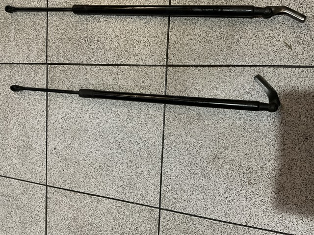 Амортизатор для багажника газовий Нісан Ноут