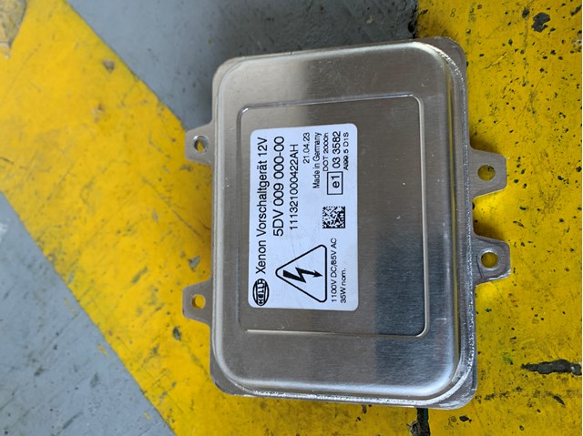 Блок управління фарами 009000001 HELLA