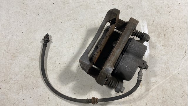 Супорт гальмівний, передній, правий 410013JA0C NISSAN