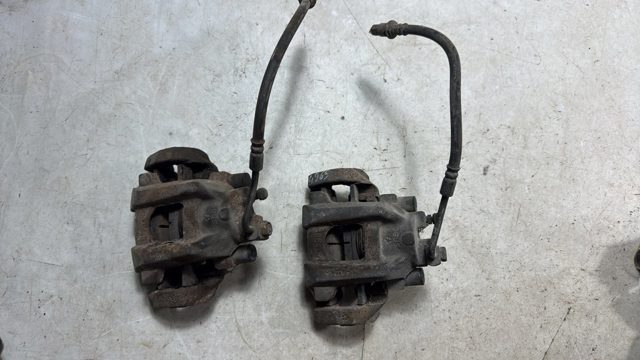 Супорт гальмівний задній правий 68052376AA CHRYSLER