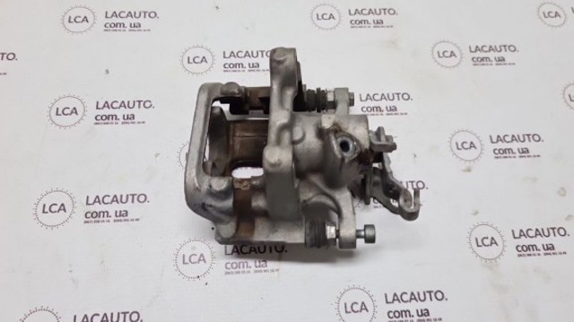 Супорт гальмівний задній правий 5QM615424A VAG