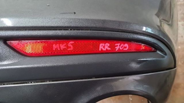 Відбивач бампера заднього правий DS7Z13A565J FORD