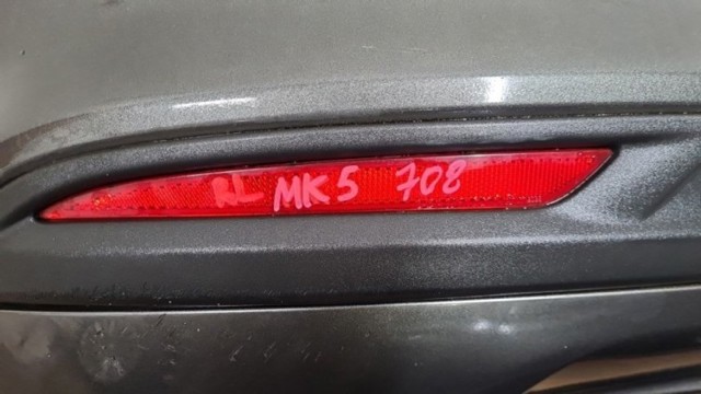 Катафот (відбивач) заднього бампера, лівий DS7Z13A565K FORD
