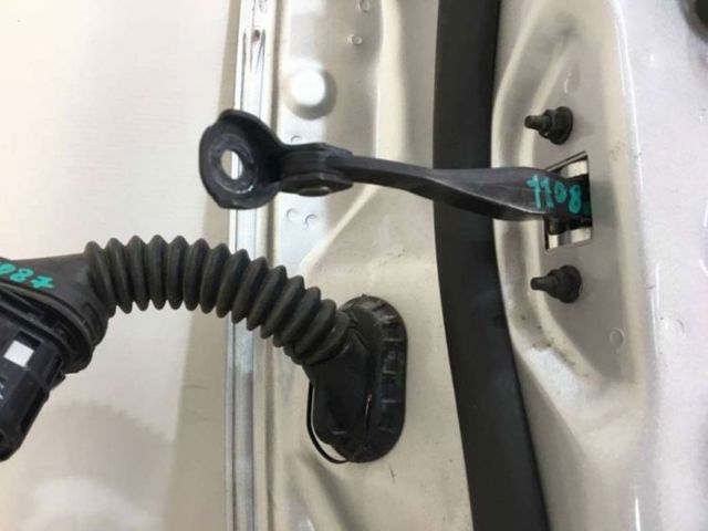 Обмежувач відкриття дверей, передній FT4Z5823552A FORD