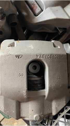 Супорт гальмівний, передній, лівий 34111163385 BMW