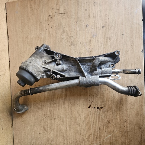 Корпус масляного фільтра 12992593 OPEL