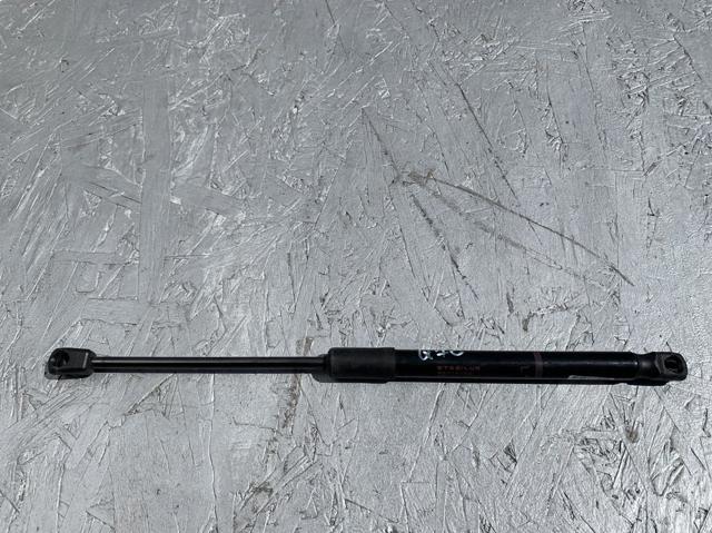 Опора капота ліва 654711MA0A NISSAN