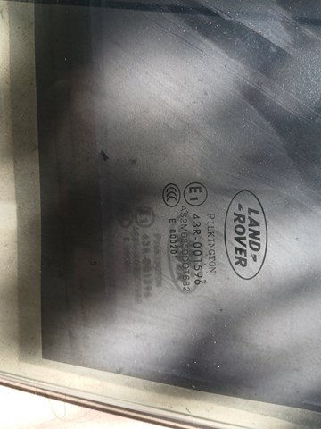 Скло водійських дверей CUB500291 LAND ROVER