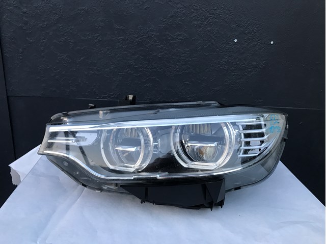 Фара основна ліва 63117377841 BMW