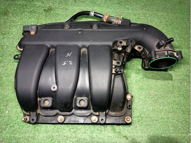 Колектор впускний FT4Z9424B FORD