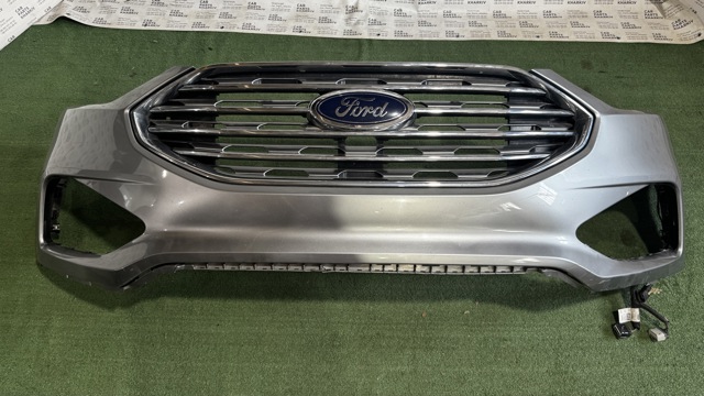 Бампер передній KT4Z17D957AAPTM FORD