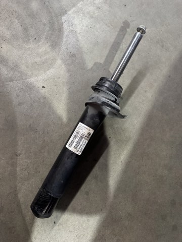 Амортизатор передньої підвіски, лівий 31306888465 BMW