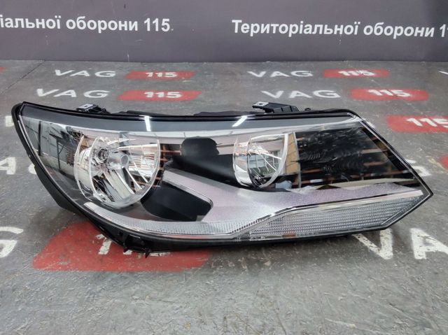 Фара передня права 1EL010749221 HELLA