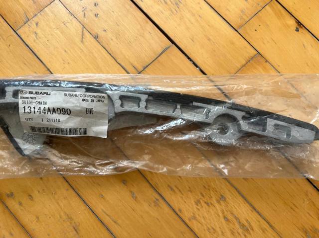 Заспокоювач ланцюга ГРМ, правий 13144AA090 SUBARU