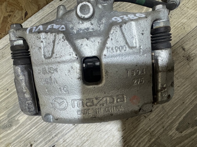 Супорт гальмівний, передній, лівий BCYA3399ZB MAZDA