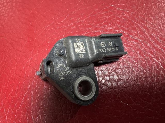 Датчик Ейрбег передній K12357K1XA MAZDA