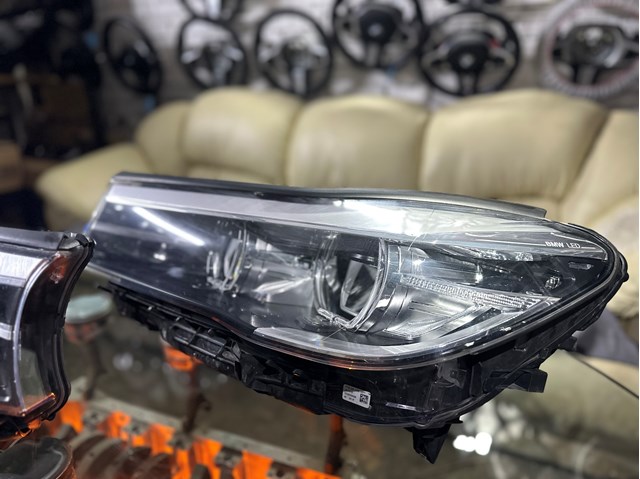 Фара основна ліва 63117408711 BMW